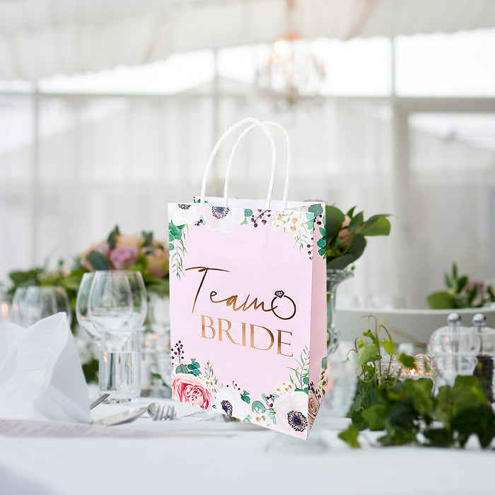 Hen Party Goody Bags Set (8 or 16 hens) Paper Bags and Accessories Light Pink Floral with Rose Gold Foil Text.